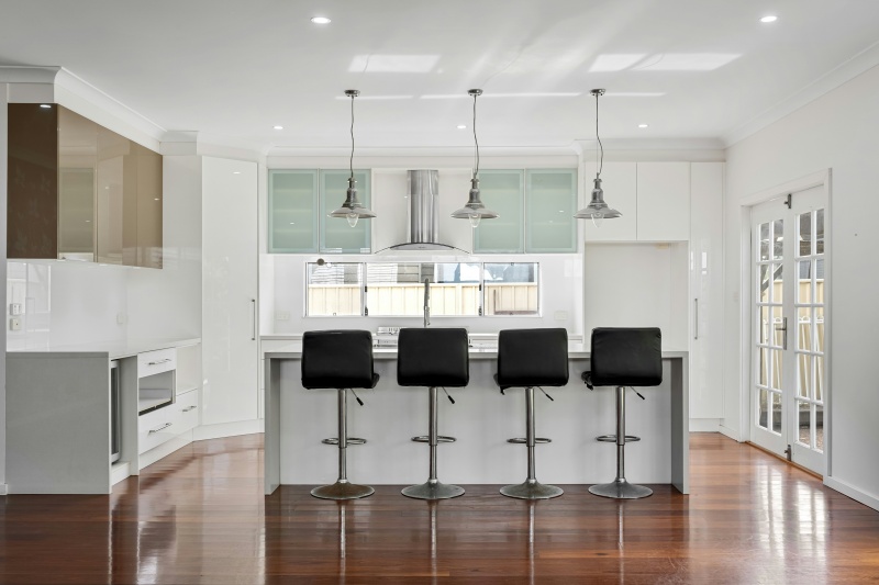 Minimalist handle free cabinet design