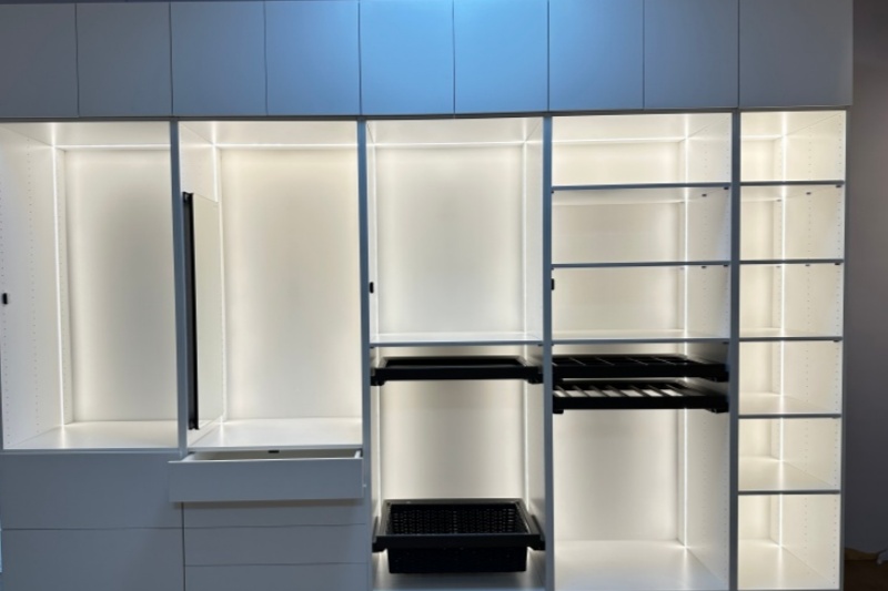 Bespoke wooden closet with automated lighting