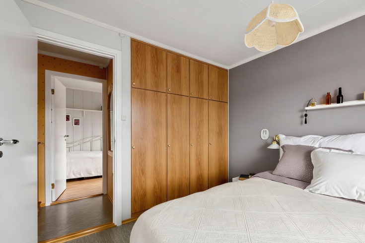 Spacious wardrobe with wood finish