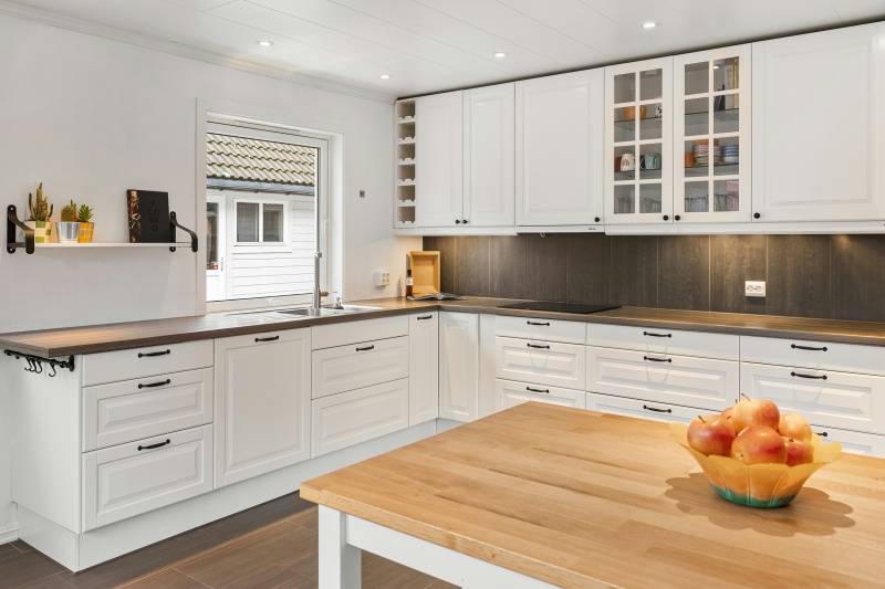Custom white cabinetry with wine display
