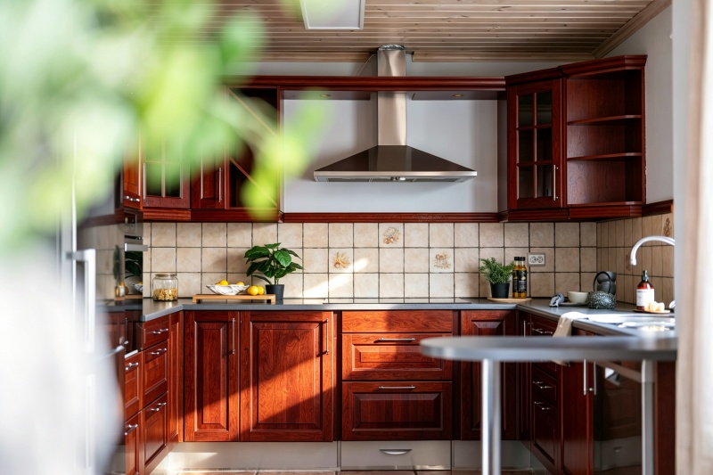Elegant farmhouse cherry wood cupboards