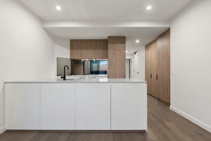 Hidden handles for flat panel cabinets