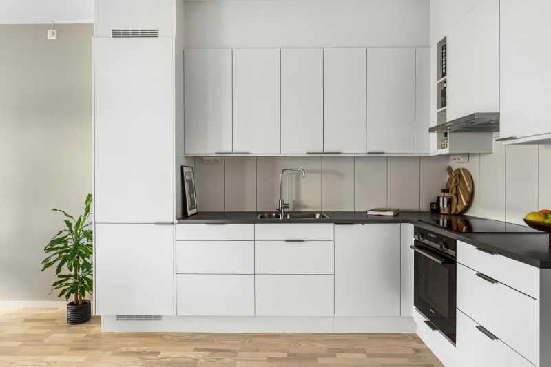 Contemporary tab edge pull cabinets