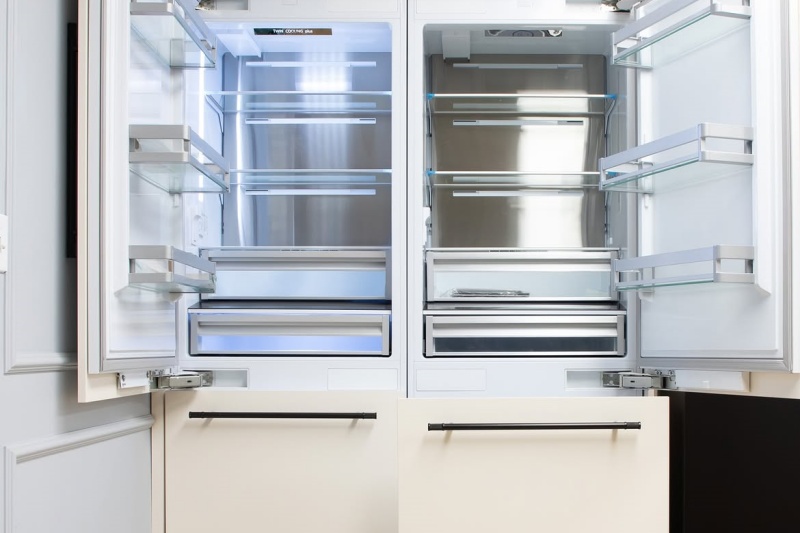 Hidden appliance covers in wooden cabinets